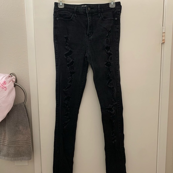 black jeans with rips all the way down